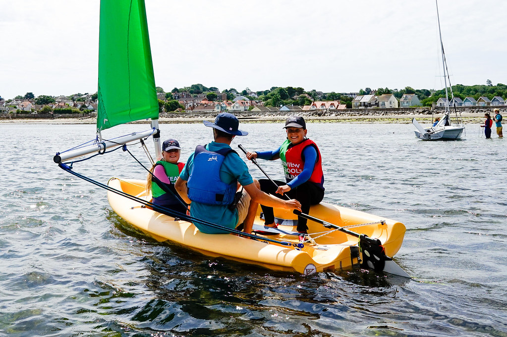 Children learning to sail